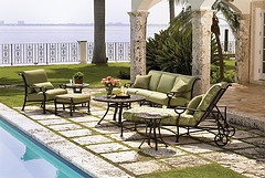 Outdoor furniture sets, outdoor furniture set by pool with couch, chair, ottoman and lounging chair in green and brown.
