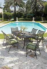 Aluminum Outdoor Furniture, seven piece metal outdoor furniture set by the pool.