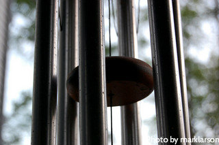 Long aluminum windchimes looking from the bottom hung in the tree, heavy duty wind chimes, metal windchimes.