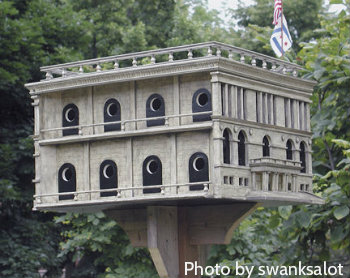 
Stone color Cathedral/Museum mansion with cement looking pillars, large custom birdhouses, patriotic birdhouses.